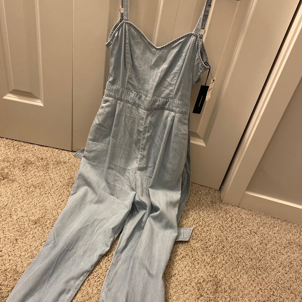 Jean appearing full leg jump suit with back tie